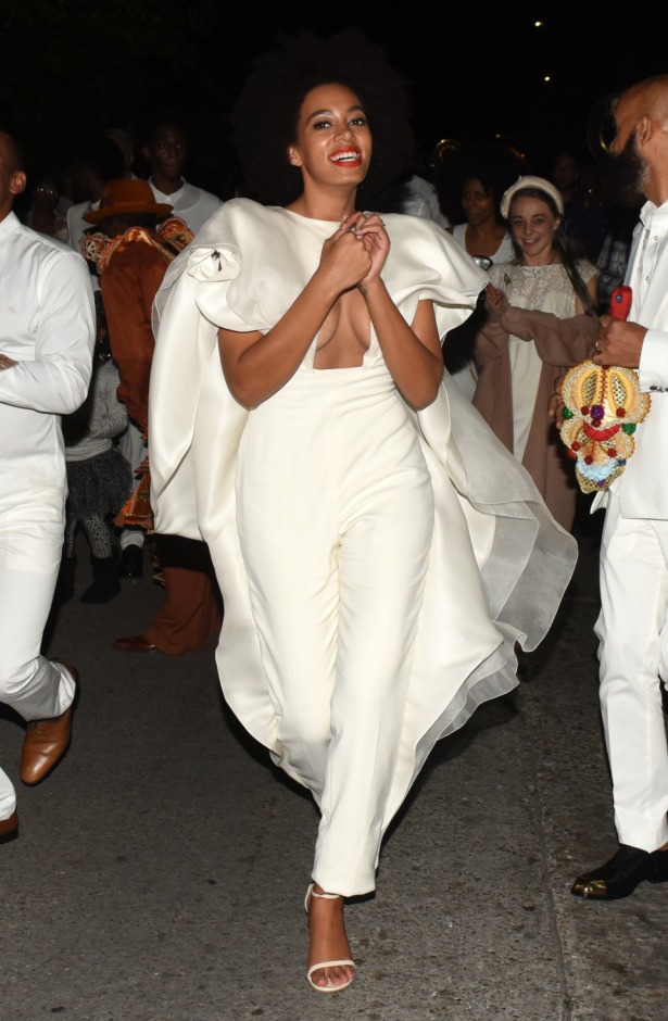 Solange attends to the wedding afterparty dressed in a Stéphane Rolland Spring 2014 Couture jumpsuit with cape